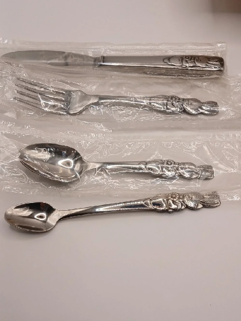 Oneida Peter Rabbit Child's Vtg Stainless Flatware Set of 4 (3 new, 1 used)